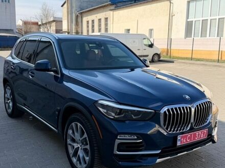 Синий БМВ Х5, объемом двигателя 3 л и пробегом 70 тыс. км за 39500 $, фото 1 на Automoto.ua
