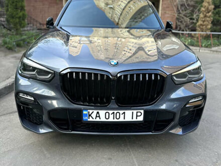 Синий БМВ Х5, объемом двигателя 3 л и пробегом 58 тыс. км за 57000 $, фото 1 на Automoto.ua