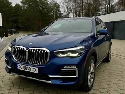 Синій БМВ Х5, об'ємом двигуна 3 л та пробігом 80 тис. км за 45000 $, фото 1 на Automoto.ua