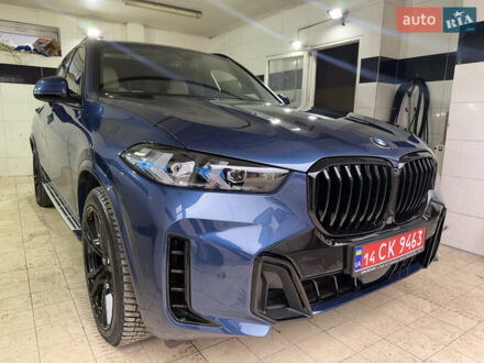 Синий БМВ Х5, объемом двигателя 3 л и пробегом 82 тыс. км за 59100 $, фото 1 на Automoto.ua