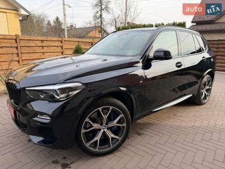 Синій БМВ Х5, об'ємом двигуна 3 л та пробігом 98 тис. км за 56900 $, фото 1 на Automoto.ua