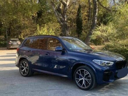 Синий БМВ Х5, объемом двигателя 3 л и пробегом 56 тыс. км за 32100 $, фото 1 на Automoto.ua