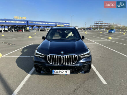 Синий БМВ Х5, объемом двигателя 3 л и пробегом 52 тыс. км за 58000 $, фото 1 на Automoto.ua