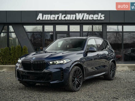 Синий БМВ Х5, объемом двигателя 3 л и пробегом 40 тыс. км за 72900 $, фото 1 на Automoto.ua