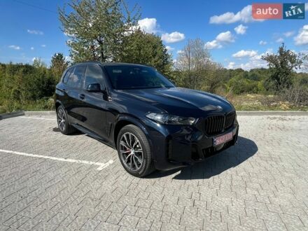 Синий БМВ Х5, объемом двигателя 3 л и пробегом 23 тыс. км за 74700 $, фото 1 на Automoto.ua