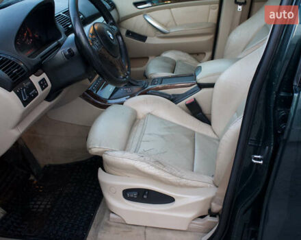 Зеленый БМВ Х5, объемом двигателя 3 л и пробегом 387 тыс. км за 10599 $, фото 15 на Automoto.ua