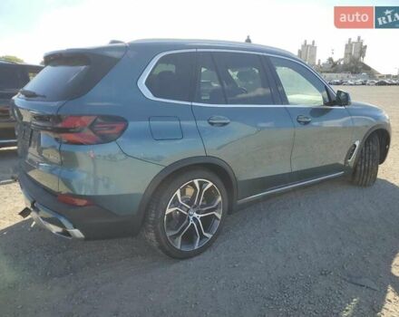 Зеленый БМВ Х5, объемом двигателя 3 л и пробегом 3 тыс. км за 94000 $, фото 2 на Automoto.ua