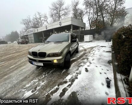 Зеленый БМВ Х5, объемом двигателя 3 л и пробегом 395 тыс. км за 10500 $, фото 1 на Automoto.ua