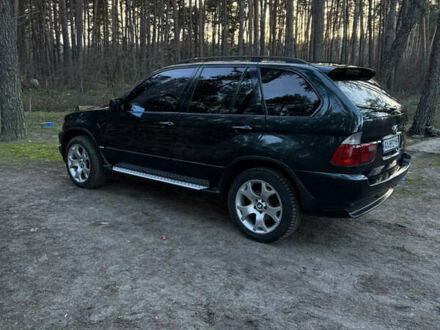 Зеленый БМВ Х5, объемом двигателя 3 л и пробегом 311 тыс. км за 9500 $, фото 1 на Automoto.ua