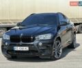 Черный БМВ Х6 М, объемом двигателя 4.39 л и пробегом 87 тыс. км за 39500 $, фото 1 на Automoto.ua