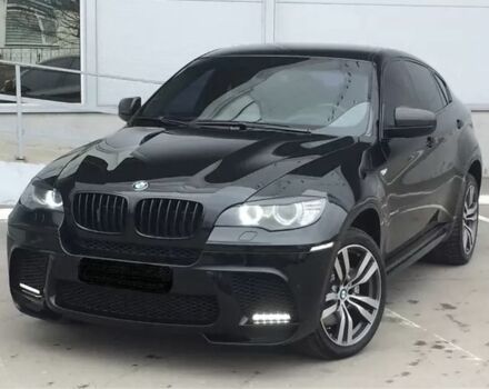 Черный БМВ Х6 М, объемом двигателя 4.4 л и пробегом 143 тыс. км за 21500 $, фото 1 на Automoto.ua