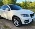 Белый БМВ Х6, объемом двигателя 3 л и пробегом 244 тыс. км за 408 $, фото 2 на Automoto.ua