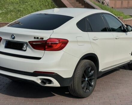Белый БМВ Х6, объемом двигателя 3 л и пробегом 158 тыс. км за 25000 $, фото 4 на Automoto.ua