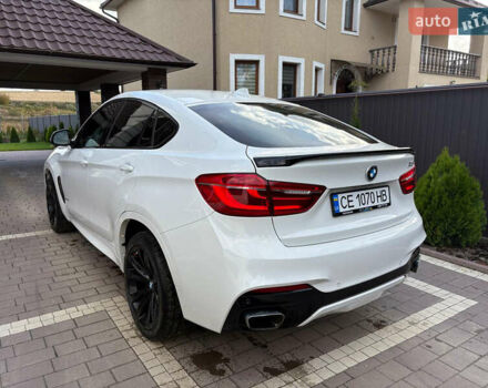 Белый БМВ Х6, объемом двигателя 3 л и пробегом 125 тыс. км за 34800 $, фото 1 на Automoto.ua