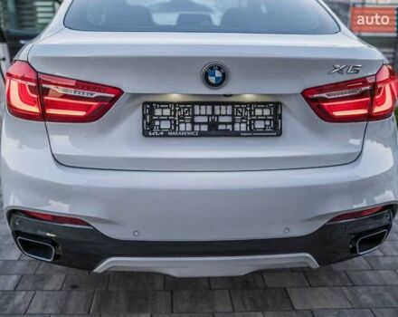 Белый БМВ Х6, объемом двигателя 3 л и пробегом 300 тыс. км за 33549 $, фото 2 на Automoto.ua