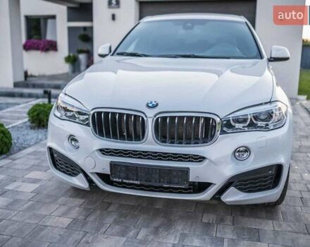 Белый БМВ Х6, объемом двигателя 3 л и пробегом 300 тыс. км за 33549 $, фото 1 на Automoto.ua