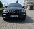Черный БМВ Х6, объемом двигателя 4.4 л и пробегом 150 тыс. км за 20000 $, фото 1 на Automoto.ua