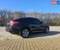 Чорний БМВ Х6, об'ємом двигуна 3 л та пробігом 230 тис. км за 10800 $, фото 1 на Automoto.ua