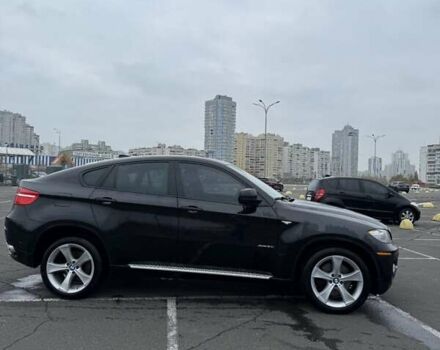 Черный БМВ Х6, объемом двигателя 4.4 л и пробегом 215 тыс. км за 12500 $, фото 4 на Automoto.ua