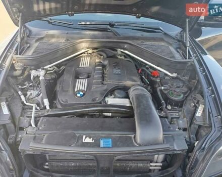 Черный БМВ Х6, объемом двигателя 3 л и пробегом 133 тыс. км за 12800 $, фото 13 на Automoto.ua