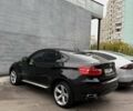 Черный БМВ Х6, объемом двигателя 4.4 л и пробегом 215 тыс. км за 12500 $, фото 1 на Automoto.ua