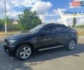 Черный БМВ Х6, объемом двигателя 3 л и пробегом 133 тыс. км за 12800 $, фото 6 на Automoto.ua
