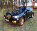 Черный БМВ Х6, объемом двигателя 3 л и пробегом 295 тыс. км за 12800 $, фото 1 на Automoto.ua