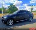 Черный БМВ Х6, объемом двигателя 3 л и пробегом 133 тыс. км за 17000 $, фото 1 на Automoto.ua