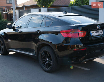 Черный БМВ Х6, объемом двигателя 3 л и пробегом 312 тыс. км за 16500 $, фото 1 на Automoto.ua