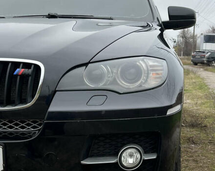 Черный БМВ Х6, объемом двигателя 3 л и пробегом 189 тыс. км за 13200 $, фото 1 на Automoto.ua