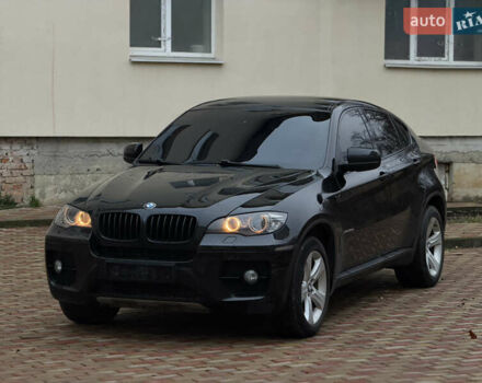 Черный БМВ Х6, объемом двигателя 3 л и пробегом 300 тыс. км за 18900 $, фото 2 на Automoto.ua