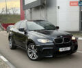 Черный БМВ Х6, объемом двигателя 4.4 л и пробегом 88 тыс. км за 17999 $, фото 1 на Automoto.ua
