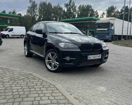 Черный БМВ Х6, объемом двигателя 3 л и пробегом 302 тыс. км за 19999 $, фото 1 на Automoto.ua