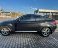 Черный БМВ Х6, объемом двигателя 3 л и пробегом 270 тыс. км за 21500 $, фото 4 на Automoto.ua