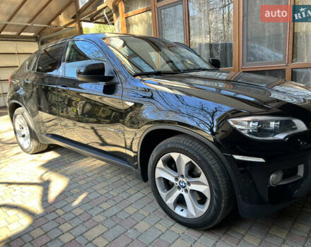 Черный БМВ Х6, объемом двигателя 3 л и пробегом 155 тыс. км за 29999 $, фото 1 на Automoto.ua
