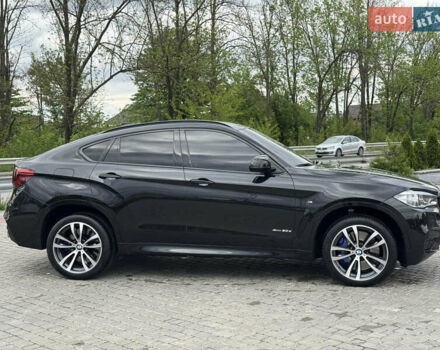 Черный БМВ Х6, объемом двигателя 3 л и пробегом 160 тыс. км за 39200 $, фото 1 на Automoto.ua