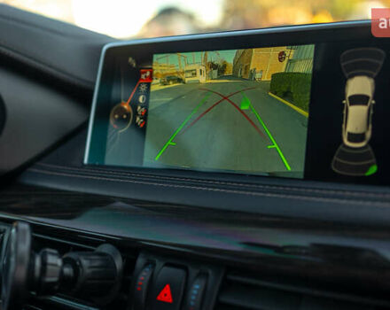 БМВ Х6 2015 в Черновцах на Automoto.ua Черный БМВ Х6, объемом двигателя 2.99 л и пробегом 158 тыс. км за 34900 $, фото 51 на Automoto.ua