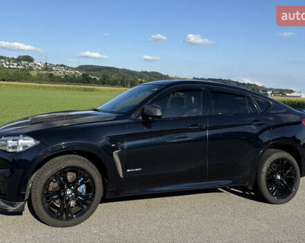 Чорний БМВ Х6, об'ємом двигуна 3 л та пробігом 173 тис. км за 38900 $, фото 4 на Automoto.ua