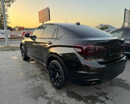 Черный БМВ Х6, объемом двигателя 3 л и пробегом 170 тыс. км за 23000 $, фото 2 на Automoto.ua