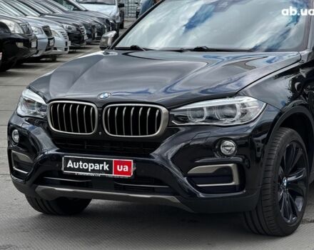 Чорний БМВ Х6, об'ємом двигуна 3 л та пробігом 144 тис. км за 28990 $, фото 1 на Automoto.ua