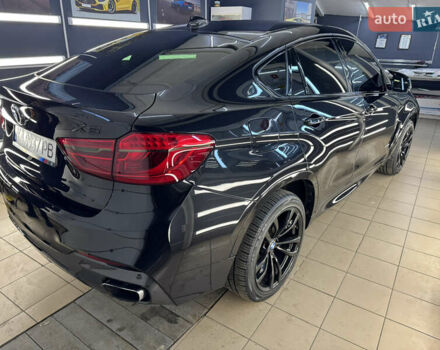 Чорний БМВ Х6, об'ємом двигуна 4.39 л та пробігом 160 тис. км за 32900 $, фото 3 на Automoto.ua