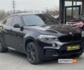 Чорний БМВ Х6, об'ємом двигуна 3 л та пробігом 117 тис. км за 39800 $, фото 1 на Automoto.ua