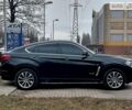 Чорний БМВ Х6, об'ємом двигуна 3 л та пробігом 95 тис. км за 49700 $, фото 1 на Automoto.ua