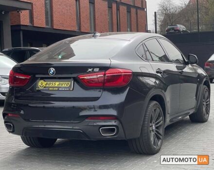 Чорний БМВ Х6, об'ємом двигуна 3 л та пробігом 117 тис. км за 39800 $, фото 5 на Automoto.ua