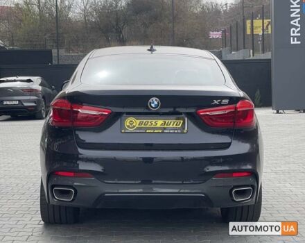 Чорний БМВ Х6, об'ємом двигуна 3 л та пробігом 117 тис. км за 39800 $, фото 4 на Automoto.ua
