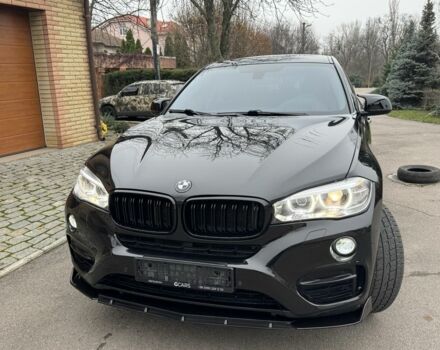 Черный БМВ Х6, объемом двигателя 3 л и пробегом 160 тыс. км за 25600 $, фото 1 на Automoto.ua