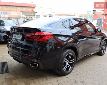 Черный БМВ Х6, объемом двигателя 3 л и пробегом 114 тыс. км за 41400 $, фото 2 на Automoto.ua