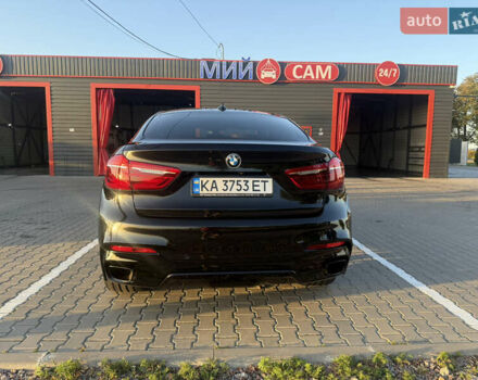 Чорний БМВ Х6, об'ємом двигуна 2.98 л та пробігом 95 тис. км за 39999 $, фото 1 на Automoto.ua