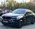 Черный БМВ Х6, объемом двигателя 3 л и пробегом 145 тыс. км за 25490 $, фото 1 на Automoto.ua