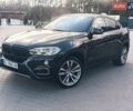 Чорний БМВ Х6, об'ємом двигуна 3 л та пробігом 132 тис. км за 26800 $, фото 1 на Automoto.ua